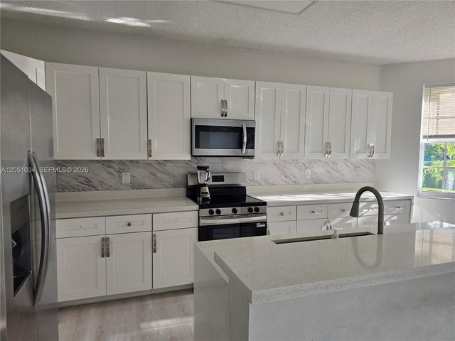 150 NW 151st Ave, Pembroke Pines, FL 33028