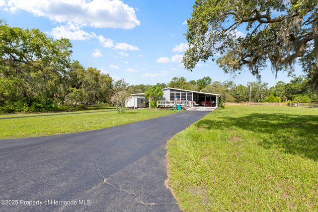 10232 Woodland Drive, Hudson, FL 34669
