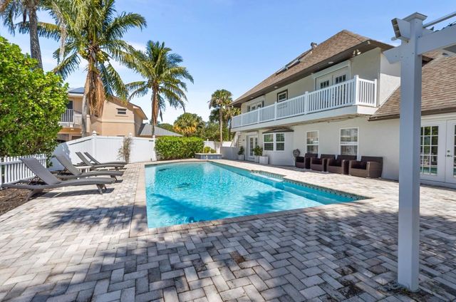 121 Queen Eugenia Court, Hutchinson Island, FL 34949