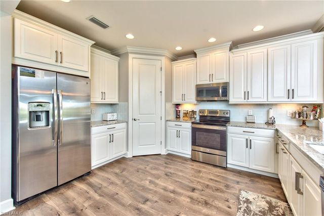 8764 Bellano CT 3-102, Naples, FL 34119