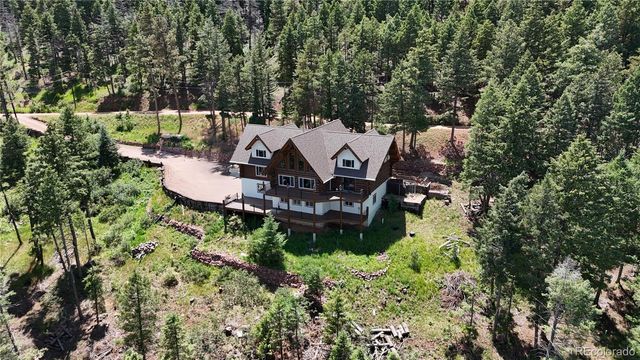 13525 Woodmoor West Drive, Larkspur, CO 80118