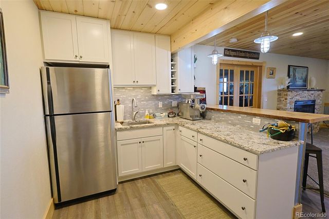 13525 Woodmoor West Drive, Larkspur, CO 80118