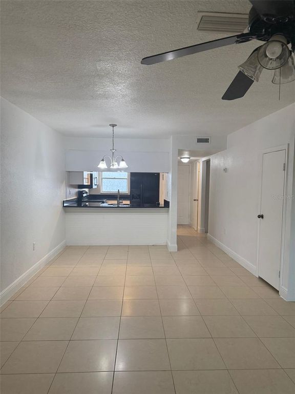 Image 2 of property listing at 6036 AMBERLY COURT T23, Orlando, FL 32822