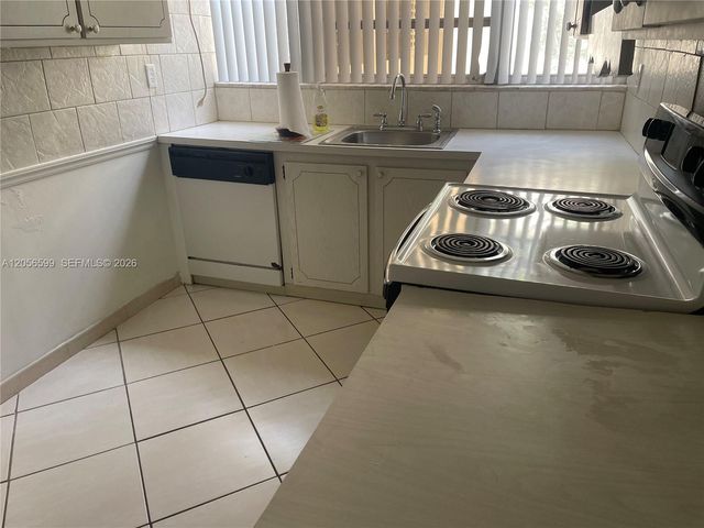 940 NE 199th Street 209, Miami, FL 33179