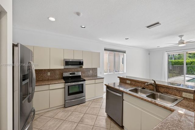 1115 Camellia Cir, Weston, FL 33326
