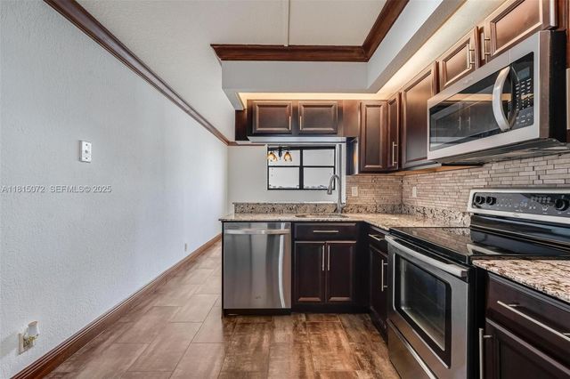 106 Lake Emerald Drive 210, Oakland Park, FL 33309