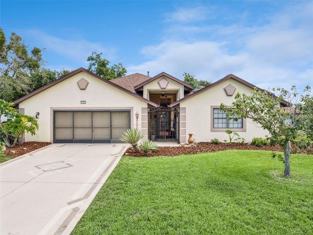 21815 TARTAN STREET, Leesburg, FL 34748