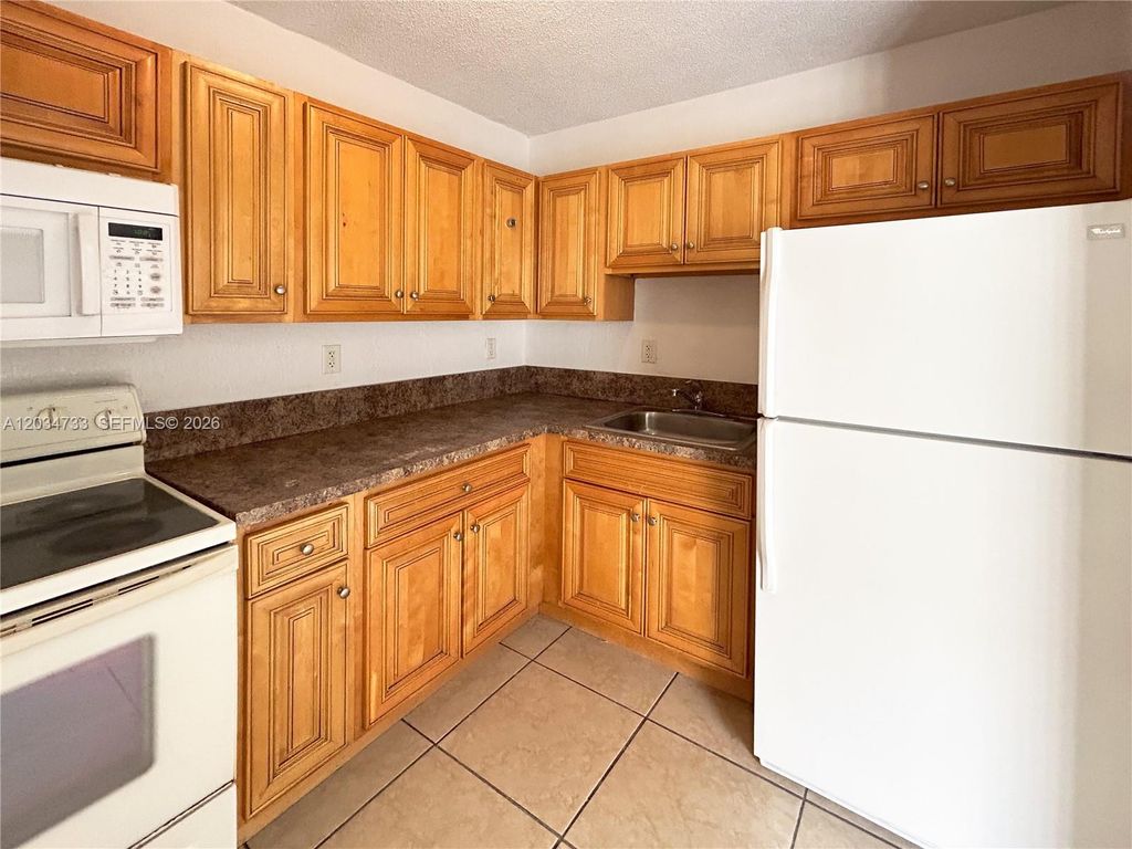 8287 NE Miami Court 102, Miami, FL 33138