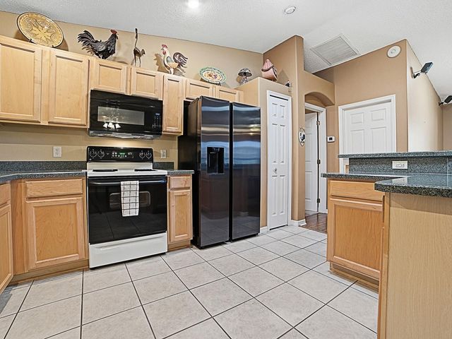 1033 MEADOWBEND DRIVE, Leesburg, FL 34748