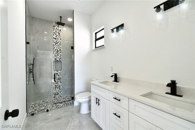 319 Lancelot AVE, Lehigh Acres, FL 33974