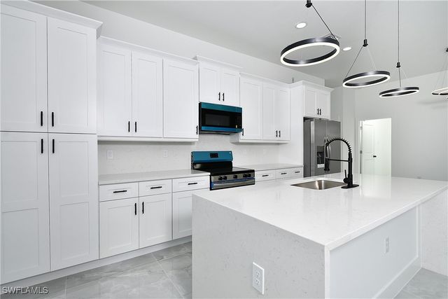 319 Lancelot AVE, Lehigh Acres, FL 33974