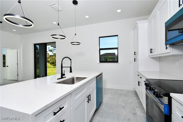 319 Lancelot AVE, Lehigh Acres, FL 33974