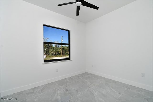 319 Lancelot AVE, Lehigh Acres, FL 33974