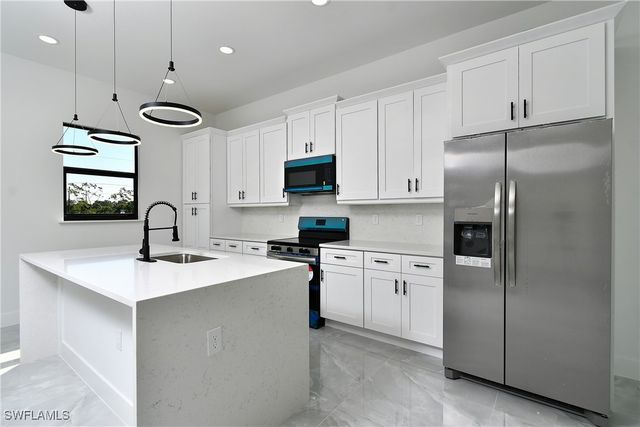 319 Lancelot AVE, Lehigh Acres, FL 33974
