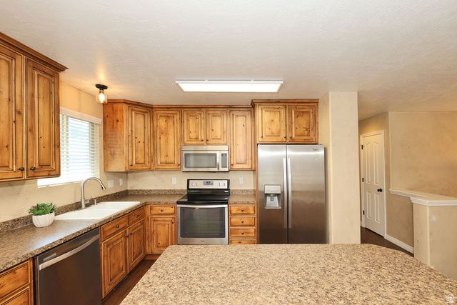 5529 S HARVEY HTS, Taylorsville, UT 84118