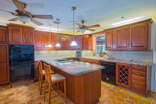 7951 W Lake Drive, Lake Clarke Shores, FL 33406