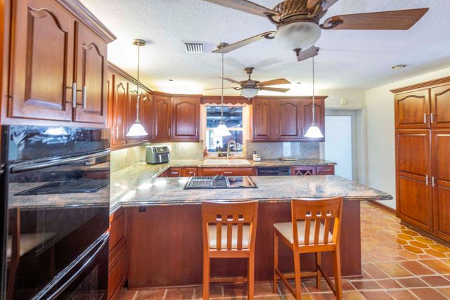 7951 W Lake Drive, Lake Clarke Shores, FL 33406