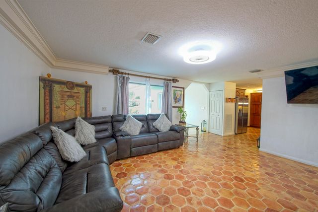 7951 W Lake Drive, Lake Clarke Shores, FL 33406