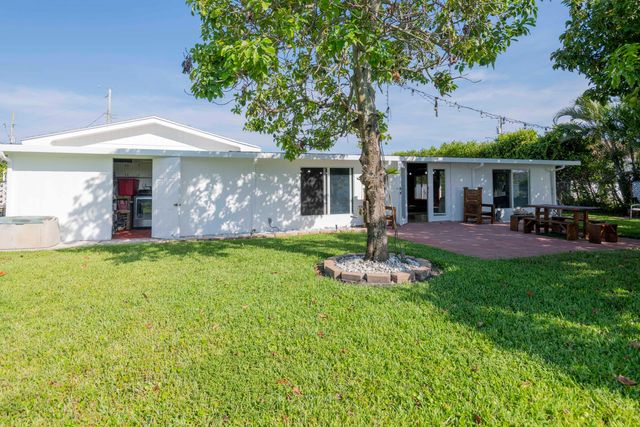 7951 W Lake Drive, Lake Clarke Shores, FL 33406
