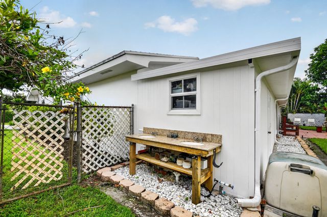 7951 W Lake Drive, Lake Clarke Shores, FL 33406