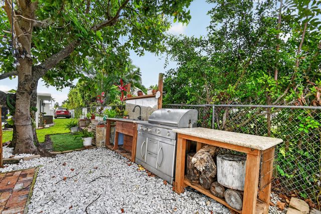 7951 W Lake Drive, Lake Clarke Shores, FL 33406