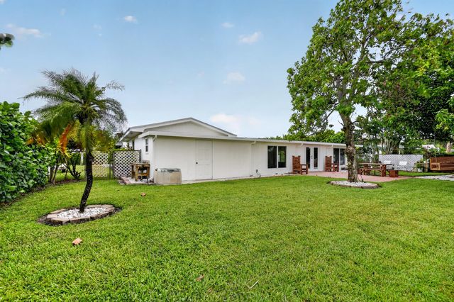 7951 W Lake Drive, Lake Clarke Shores, FL 33406