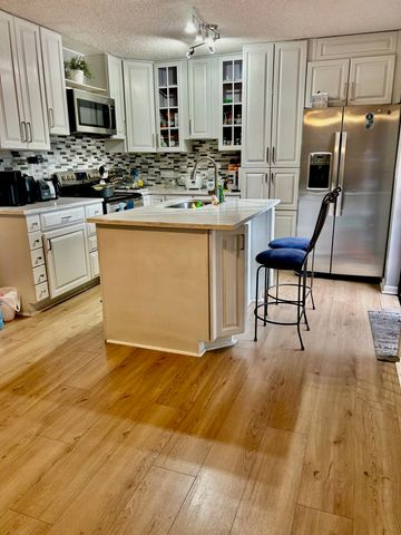 6115 Seven Springs Boulevard, Greenacres, FL 33463