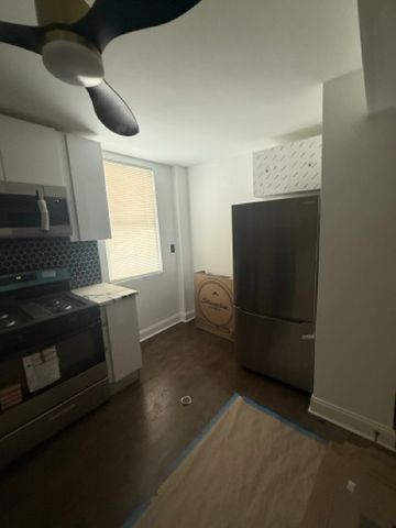 7326 S Woodlawn Avenue, Chicago, IL 60619