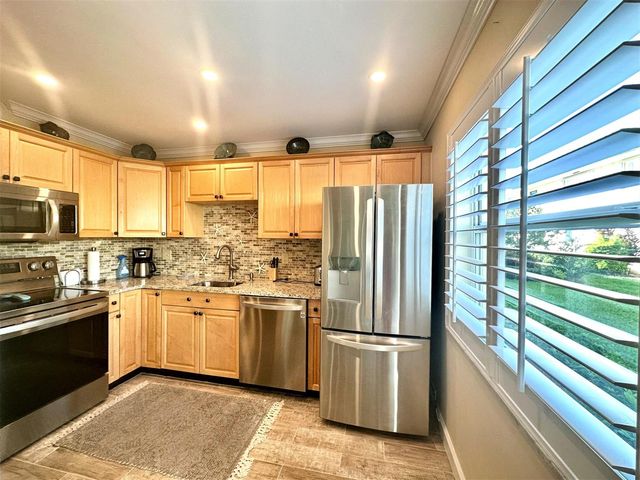 18 Colonial Club Drive 104, Boynton Beach, FL 33435