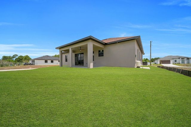3115 2nd ST SW, Lehigh Acres, FL 33976