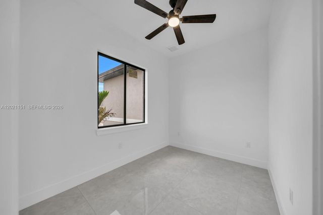 3115 2nd ST SW, Lehigh Acres, FL 33976