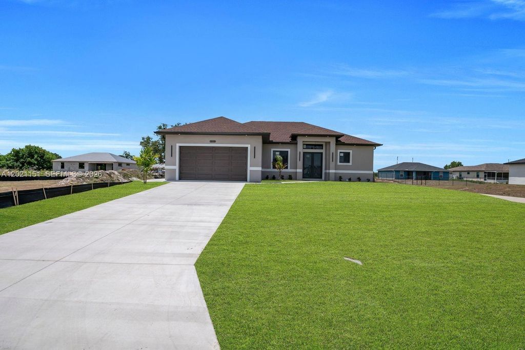 3115 2nd ST SW, Lehigh Acres, FL 33976