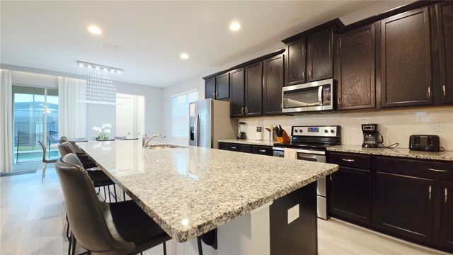 9015 PELICAN COVE TRACE, Kissimmee, FL 34747