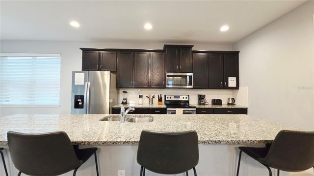 9015 PELICAN COVE TRACE, Kissimmee, FL 34747
