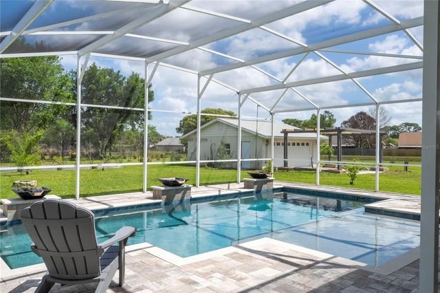 8595 MILLINOCKETT LANE, Orlando, FL 32825