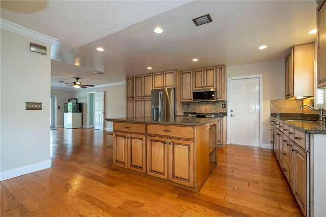 8595 MILLINOCKETT LANE, Orlando, FL 32825