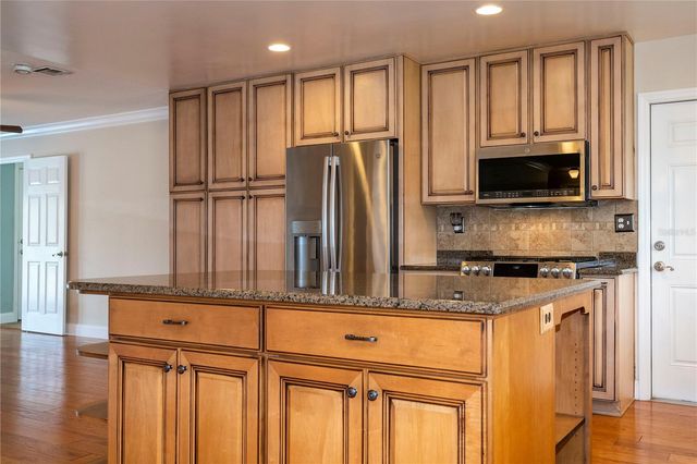 8595 MILLINOCKETT LANE, Orlando, FL 32825