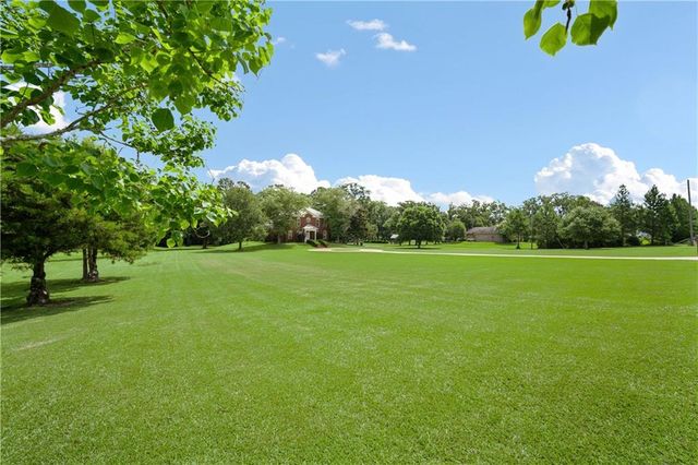 5880 Plantation Woods Drive, Theodore, AL 36582