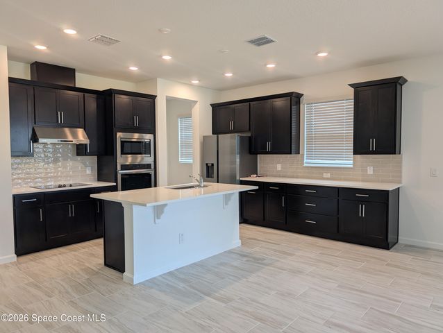 938 Soleway Avenue NW, Palm Bay, FL 32907