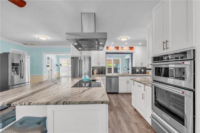 6061 Golden Oaks LN, Naples, FL 34119