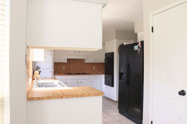 8119 Silent Cedars Drive, Houston, TX 77095