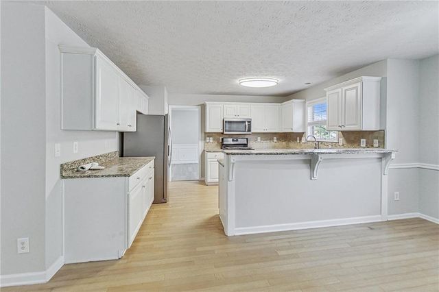 326 Canterbury Place Drive, Suwanee, GA 30024