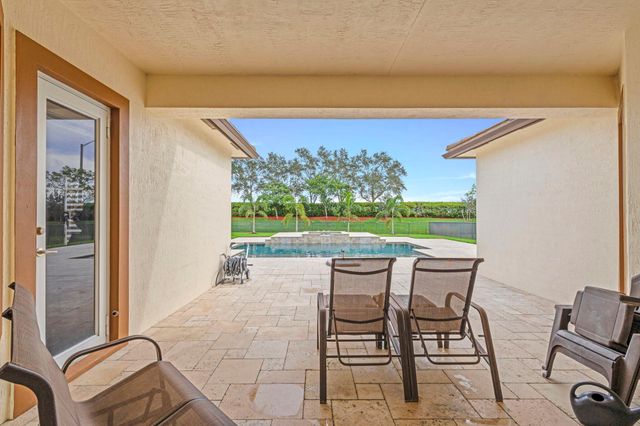 8750 Miralago Way, Parkland, FL 33076