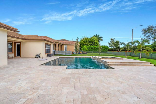 8750 Miralago Way, Parkland, FL 33076