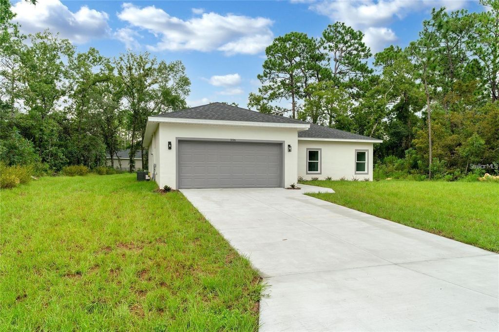 Image 2 of property listing at 556 MARION OAKS PASS, Ocala, FL 34473