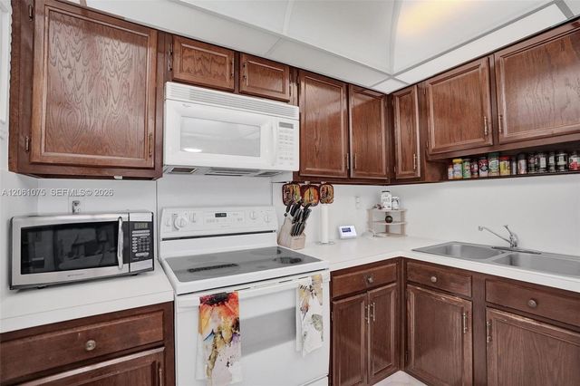 10777 W Sample Road 718, Coral Springs, FL 33065