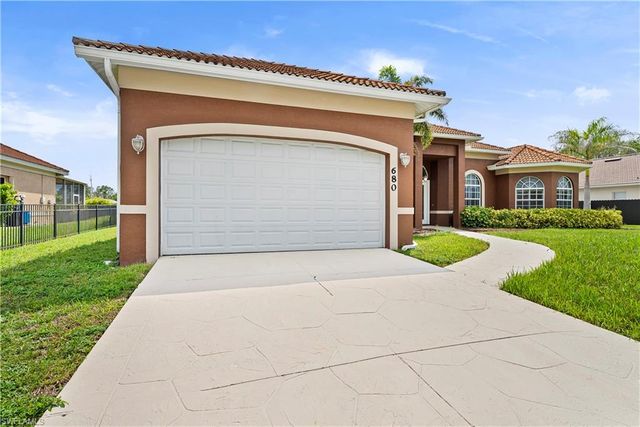 680 Mirror Lakes CT, Lehigh Acres, FL 33974