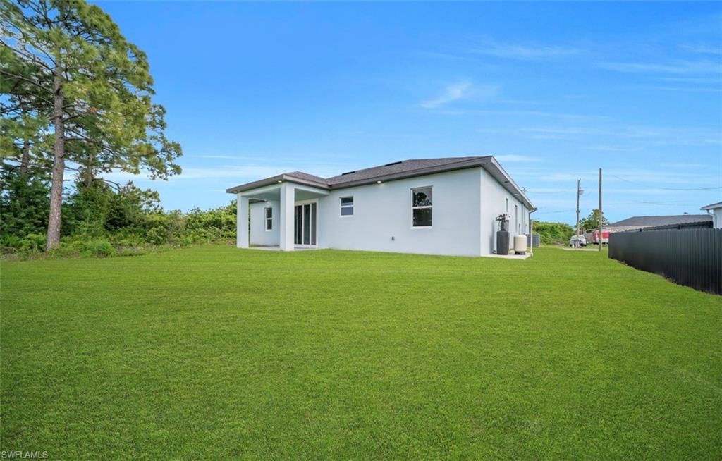 2704 15th ST SW, LEHIGH ACRES, FL 33976 — photo 2
