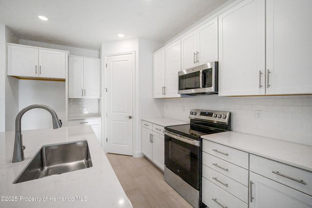 9127 PLAYERS Drive, Weeki Wachee, FL 34613