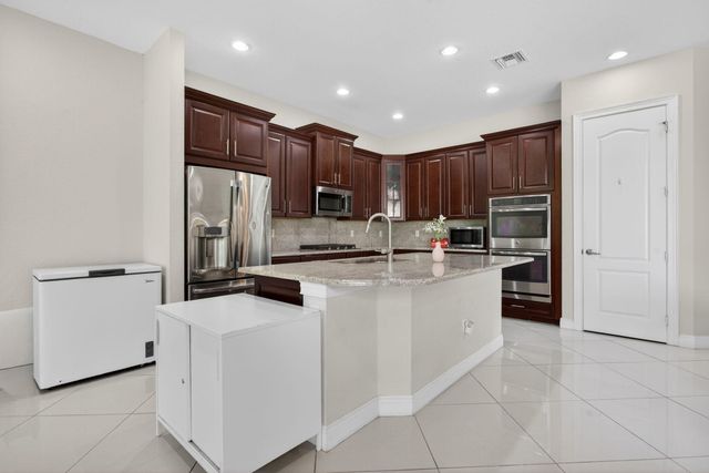 8850 Miralago Way, Parkland, FL 33076